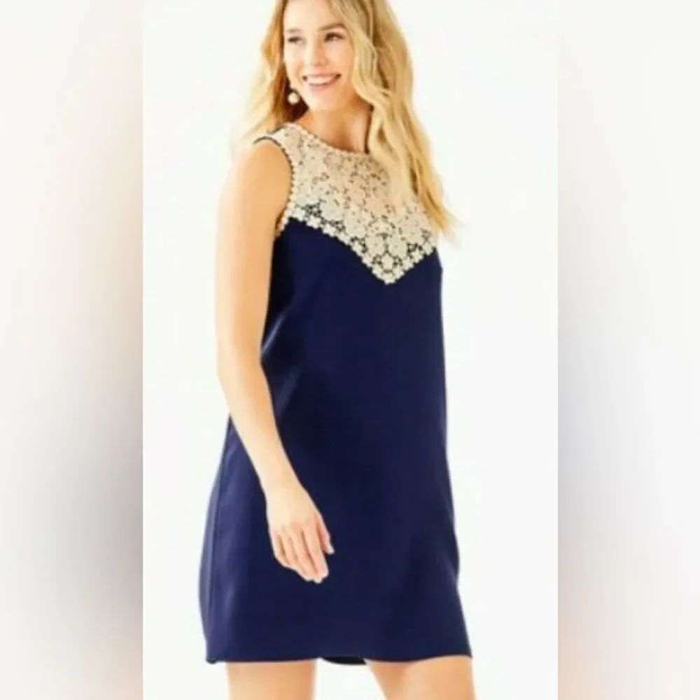 Lilly Pulitzer Nala Soft Shift Dress in navy with gold lace detail.
size 10